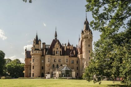 a large castle like building with a tall tower