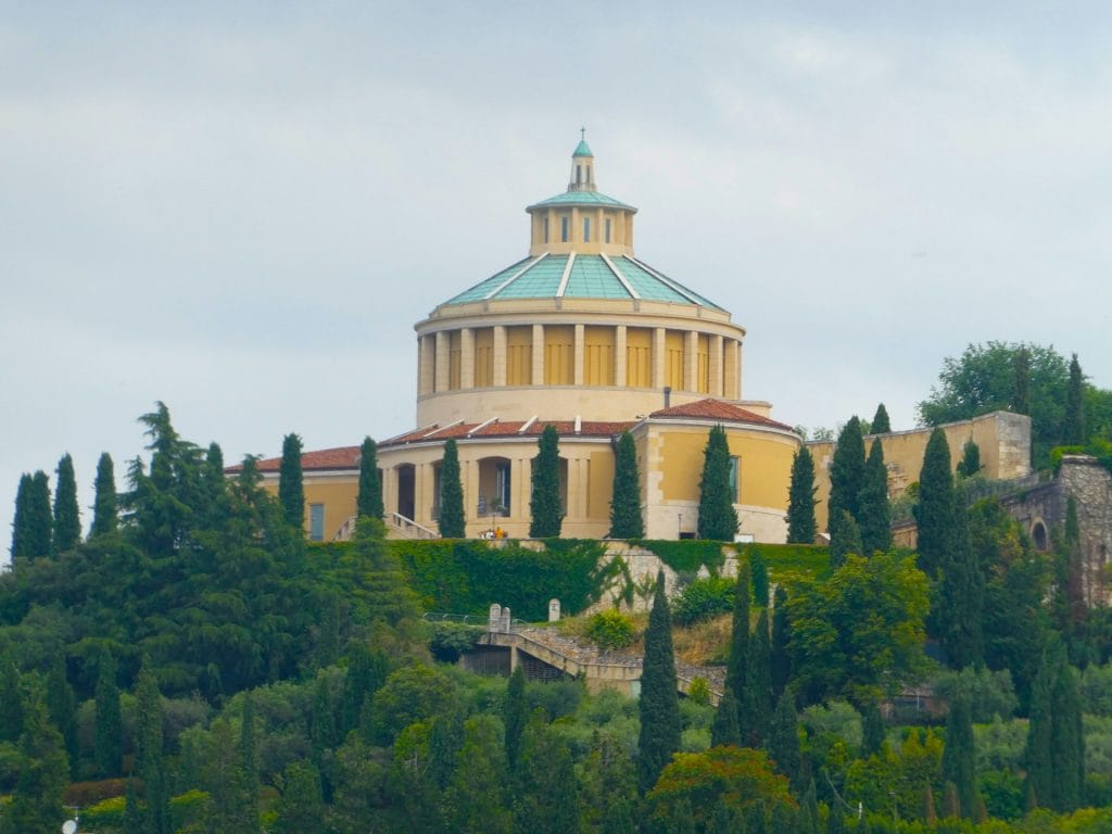 Santuario della Madonna di Lourdes, A building on top of a hill surrounded by trees