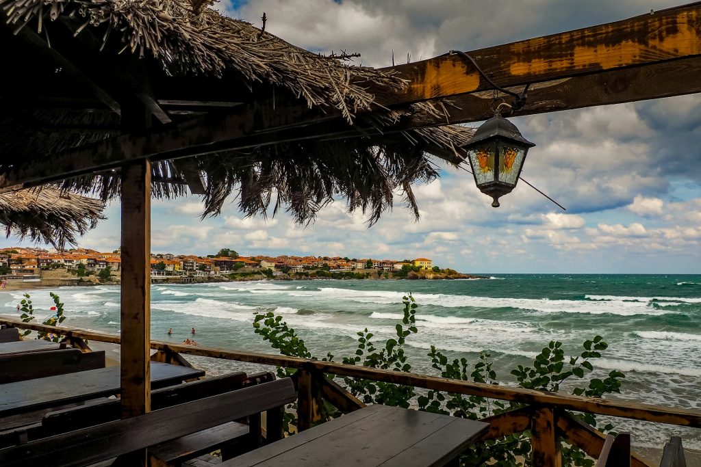 a view of the ocean from a restaurant on the beach