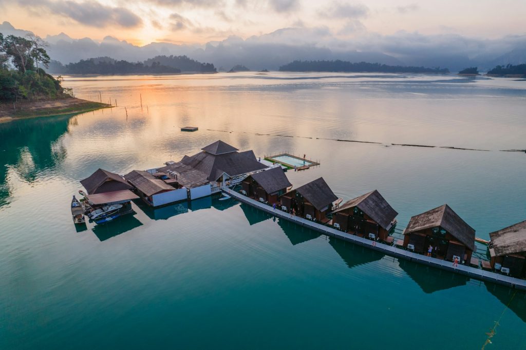 An aerial view of a boat dock with huts on it