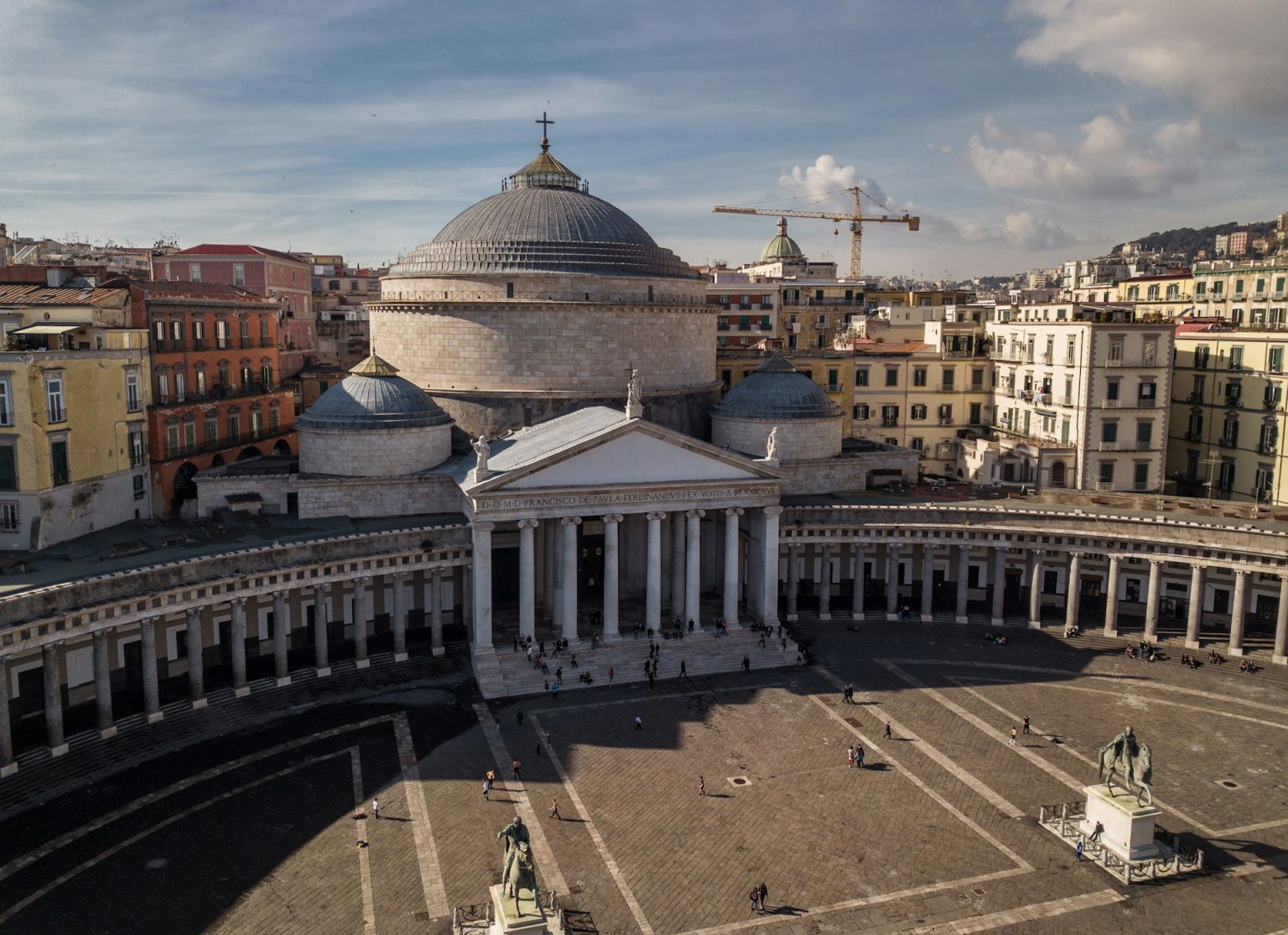 an aerial view of a large building with a dome