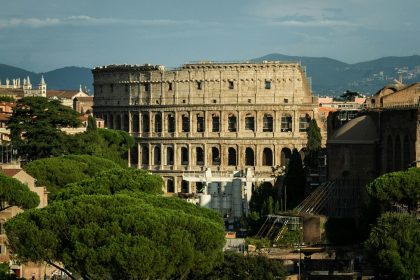 a large building with trees in front of it