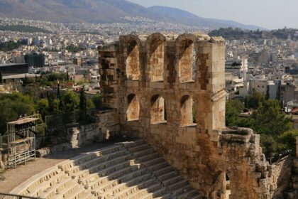 A view of a city from the top of a building